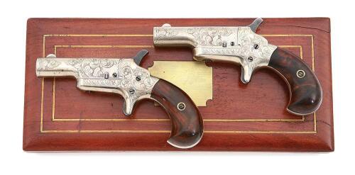 Fine Pair of Cased & Engraved Colt Third Model Thuer Deringers