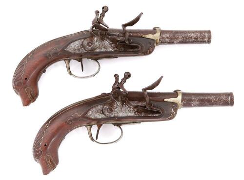 Pair of Mediterranean Flintlock Coat Pistols with Carved Dog's Head Grips