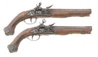 Ornate Pair of Italian Silver-Mounted Miquelet Coat Pistols