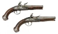 Pair of French Silver-Mounted Flintlock Pocket Pistols by Mollet