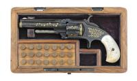 Magnificent Gustave Young Engraved and Gold Inlaid Smith & Wesson Model 1 1/2 Second Issue Factory Exhibition Revolver