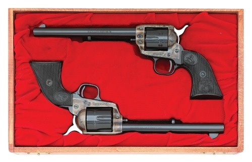 Cased Colt Second Generation Single Action Army Revolver and Colt Peacemaker 22 Buntline Scout Single Action Revolver