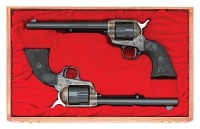 Cased Colt Second Generation Single Action Army Revolver and Colt Peacemaker 22 Buntline Scout Single Action Revolver