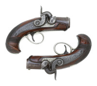 Fabulous Pair Of The Tiniest Engraved Peanut Deringers By J.E. Evans Of Philadelphia